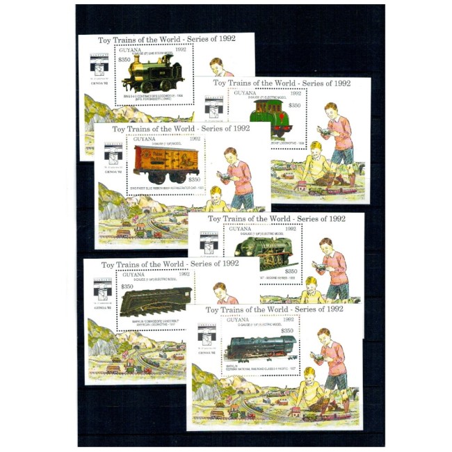 Guyana 1992 - Locomotive, Craciun, machete, jucarii, set 6 minicoli si 6 colite neuzate Guyana 1992 - Locomotive, Craciun, machete, jucarii, set 6 minicoli si 6 colite neuzate